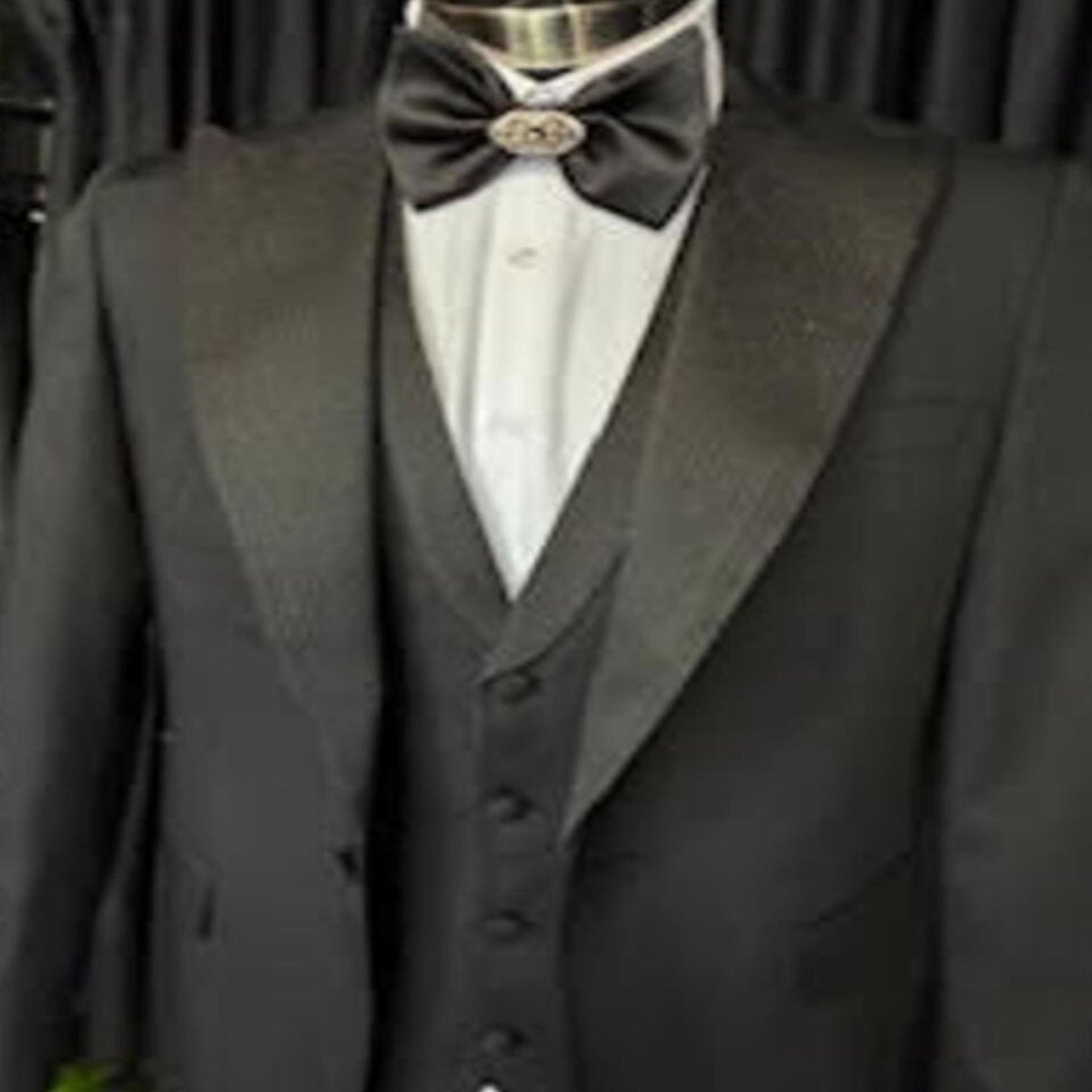 Black tuxedo with silver lapel and matching vest – elegant men’s formal suit for weddings and special events