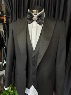 Black tuxedo with silver lapel & panelled vest – tailored for grooms or formal occasions. Elegant, modern, and unforgettable.